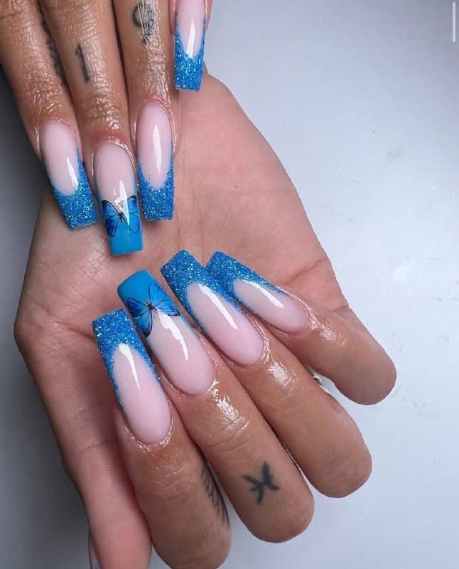 Blue butterfly nails